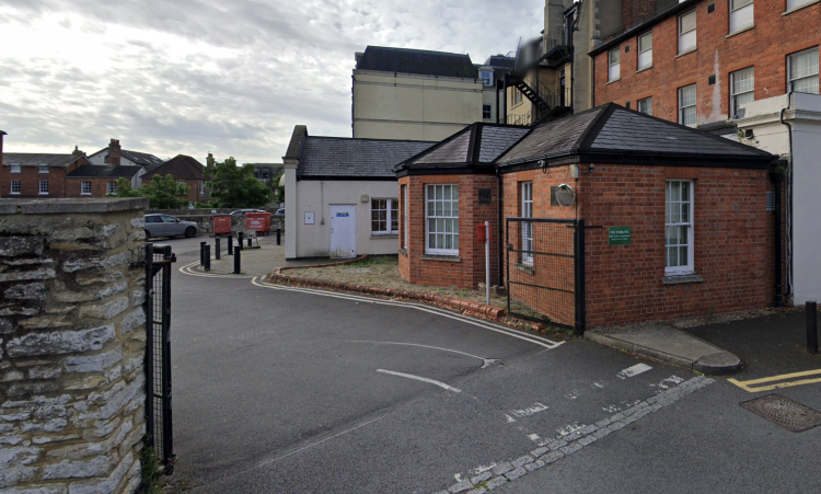 Man in ski mask robs woman of handbag outside bank in Swindon