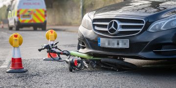 Woman rushed to hospital after bicycle crushed by car in Swindon