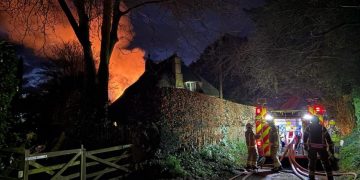 50 firefighters tackle thatched cottage blaze on Wiltshire border