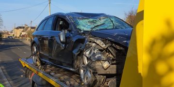 Car hits stone wall and overturns in smash outside Wiltshire pub