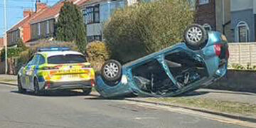 Woman taken to hospital after flipping car onto roof in Trowbridge