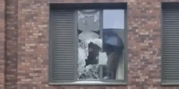 Video shows man smashing Swindon hotel window and jumping out