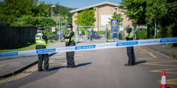 Specialist search team scour Swindon school for possible bomb