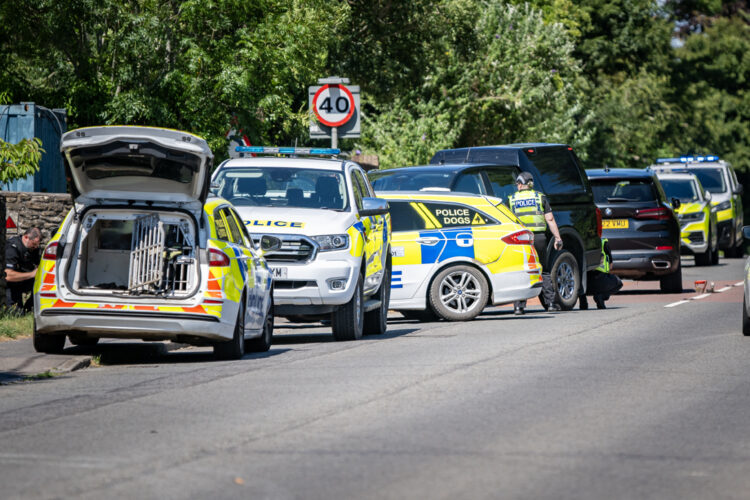 Armed police swarm house near Trowbridge with major road shut