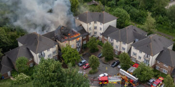 Huge blaze engulfs block of flats in town near Wiltshire border
