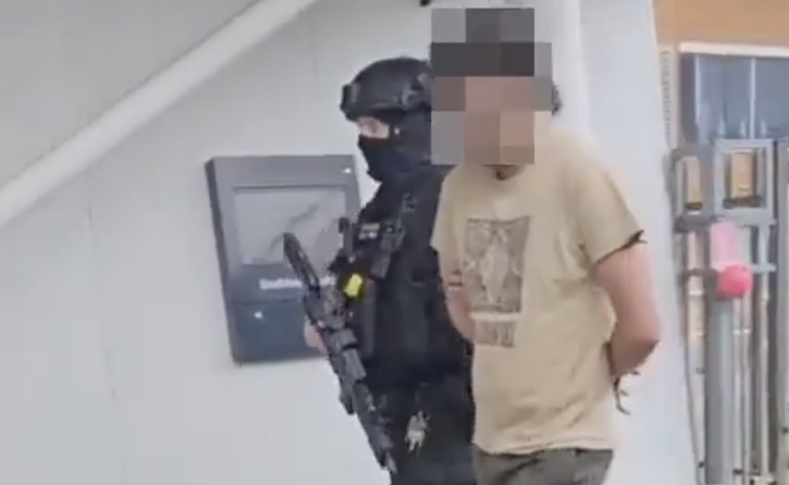 Armed police storm train following report of man carrying gun