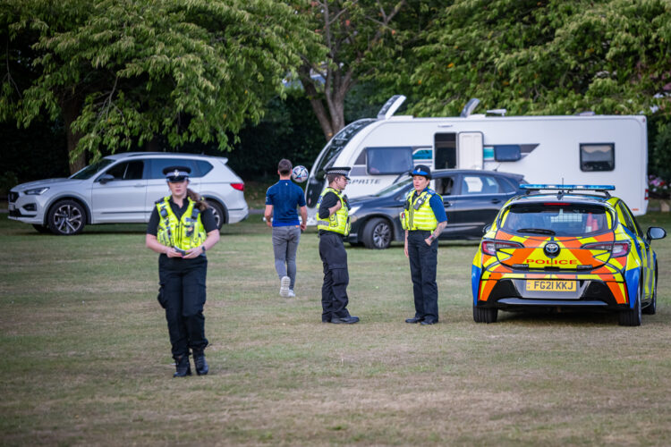 Locals clap as police force travellers to leave Chippenham park
