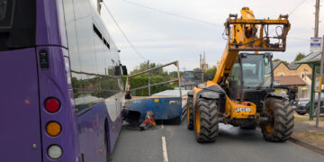 Two people injured after trailer smashes into bus near Melksham