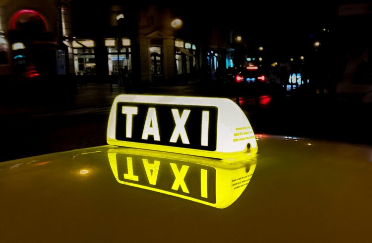 Taxi driver suspended after ‘pestering young girl for a kiss’
