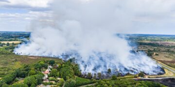 Fire service declares major incident as 100 firefighters tackle blaze