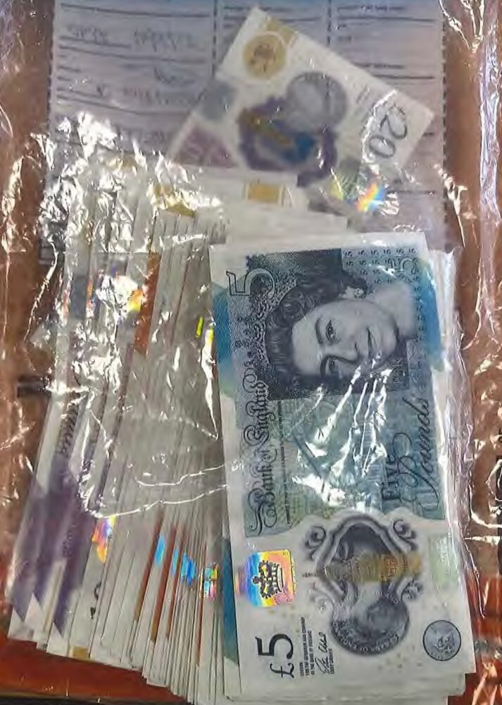 Some bank notes in a clear plastic bag