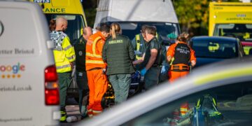 Elderly man knocked down by van outside shop fighting for his life
