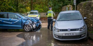 Woman driver ‘suffering medical episode’ smashes into parked cars