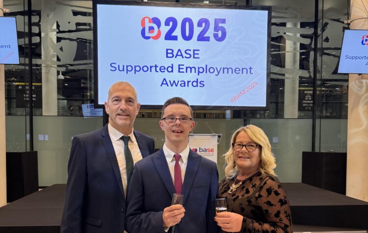 Luke Newton (centre) was awarded second place for the David Grainger Award at the British Association for Supported Employment ceremony at Wembley Stadium