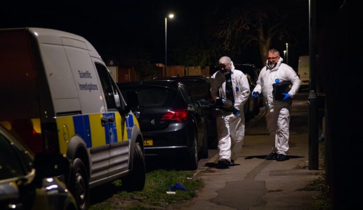 Forensics swoop as woman, 50s, ‘killed’ – as teen held in custody