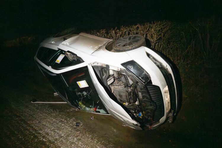 Car overturns after driver loses control on frozen road near Calne
