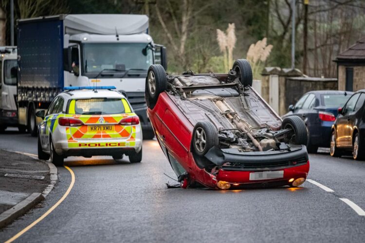 Woman ‘shaken up’ after flipping car onto roof in dramatic crash