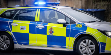 Woman ‘shaken up’ after flipping car onto roof in dramatic crash