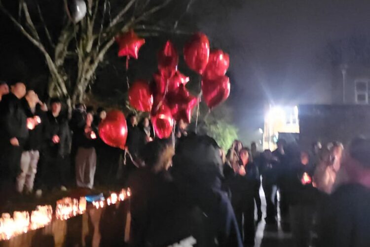 Dozens gather for emotional memorial event for murdered Shayne