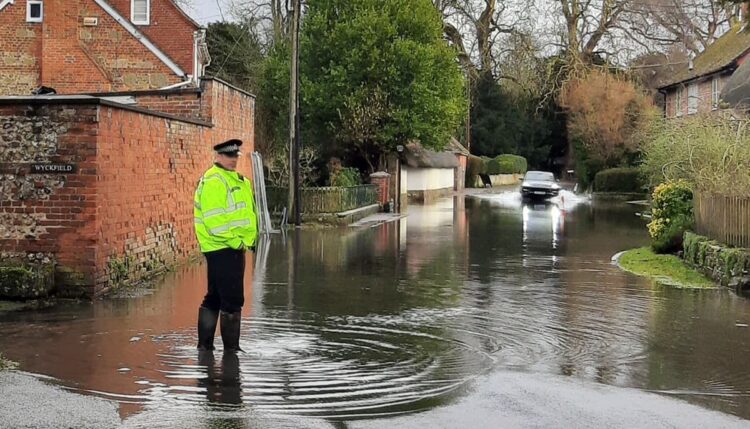 Police warn drivers after going through village flood at ‘high speed’