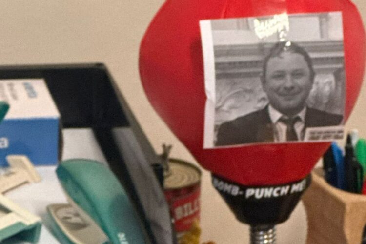 Photo of Wiltshire journalist stuck to punchbag in council office