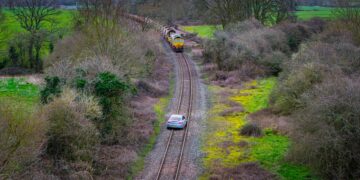 Three arrested after car driven onto railway tracks in police chase