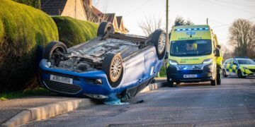 Busy road near Melksham closed as car flips onto roof in crash