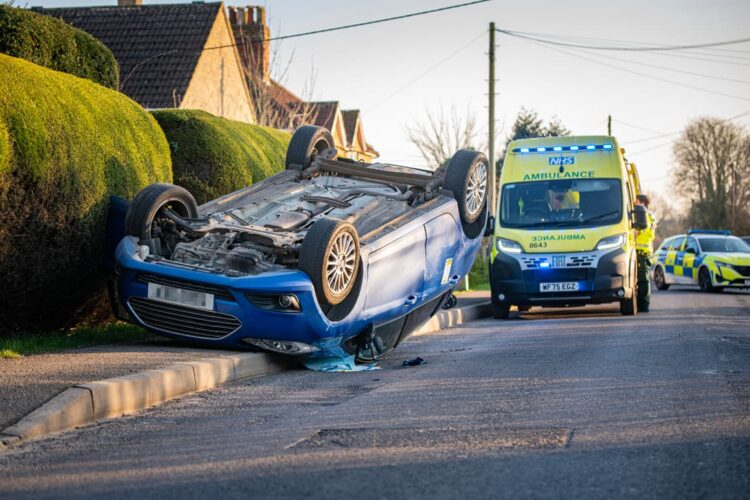 Busy road near Melksham closed as car flips onto roof in crash