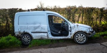 Police launch hunt for driver after wrecked van found in ditch