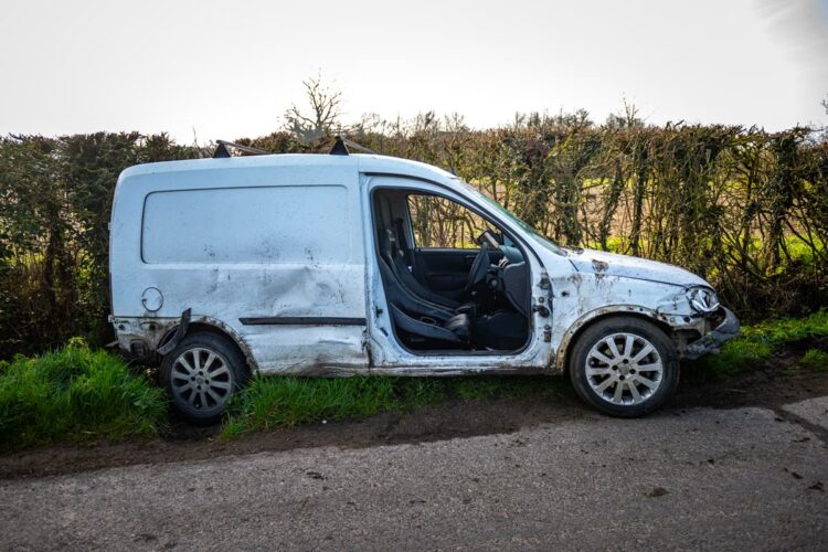 Police launch hunt for driver after wrecked van found in ditch