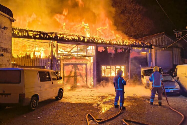 Industrial unit engulfed in flames as firefighters tackle huge blaze