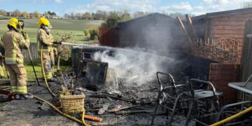 Explosion risk as firefighters race to tackle shed blaze in village