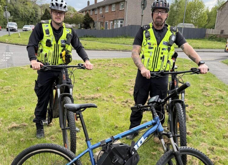 Police officers patrolling on bicycles seize illegal e-bike in Swindon