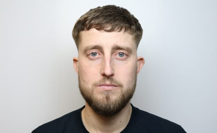 Swindon man banned from football matches after punching officer