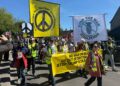 Anti-war campaigners chant ‘hands off Iran’ in RAF Fairford protest