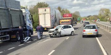 Car wrecked after crash with lorry on A419 as motorists face delays