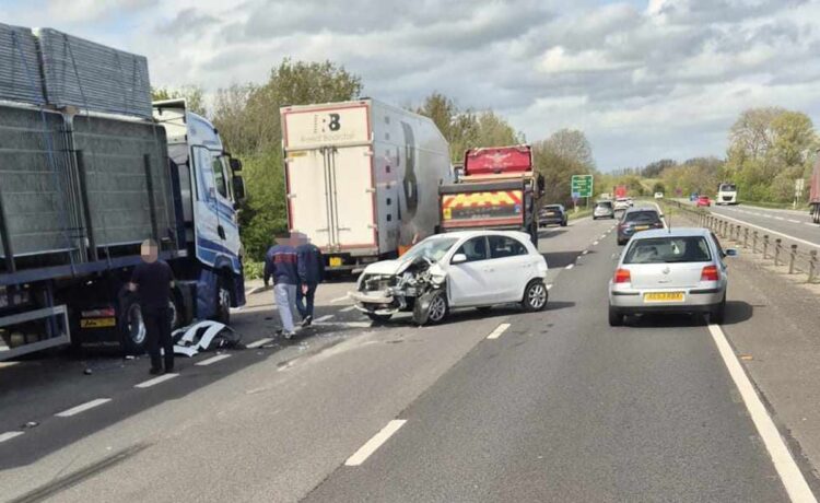 Car wrecked after crash with lorry on A419 as motorists face delays