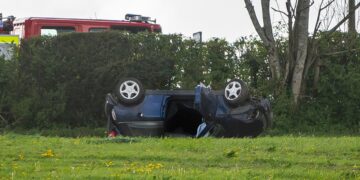 Woman killed in Wiltshire horror crash as Mini overturns in field