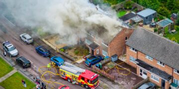 Smoke plume as firefighters battle major house fire in Chippenham
