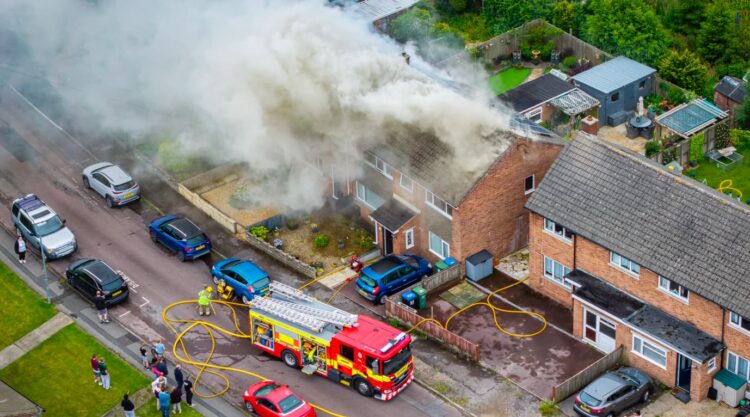Smoke plume as firefighters battle major house fire in Chippenham