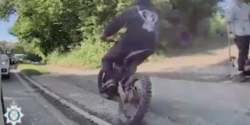 Police hunt illegal e-bike rider who nearly knocked down dog walker
