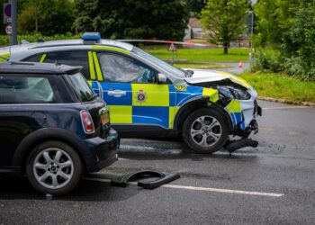 Woman in hospital after Mini hit by police car responding to 999 call