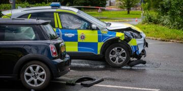 Woman in hospital after Mini hit by police car responding to 999 call