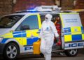 Forensics examine car in alleyway following hit-and-run in Swindon