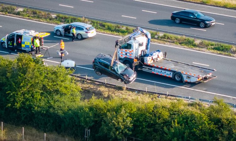 Horror M4 crash claims life of teen as car careers off carriageway