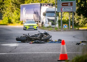 Biker fighting for his life after crashing through A36 roundabout