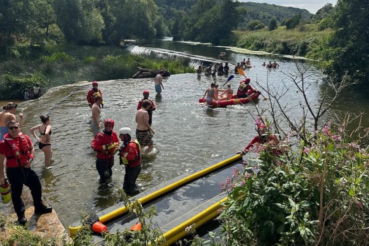 Firefighters warn people of hidden water dangers at popular weir