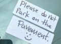 Woman who parked on kerb angry after stickers left on windscreen