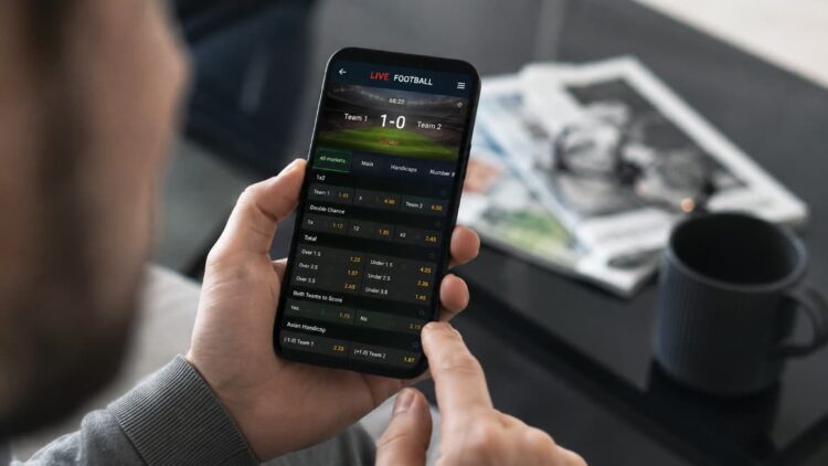 phone, live odds, coffee mug