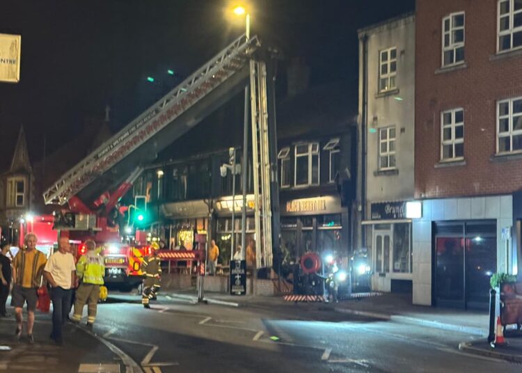 Girl arrested after scaling roof of four-storey building in Swindon